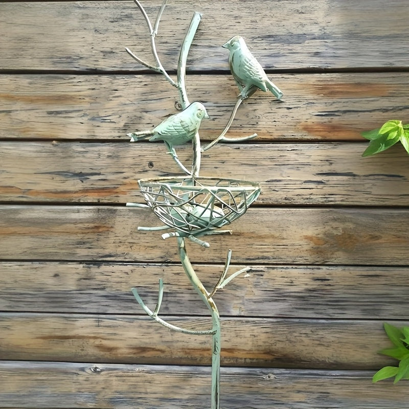 An exquisite faux tree-shaped garden stake with a beautifully crafted simulated bird's nest, perfect for farmhouse gardens and villa courtyard landscaping decor