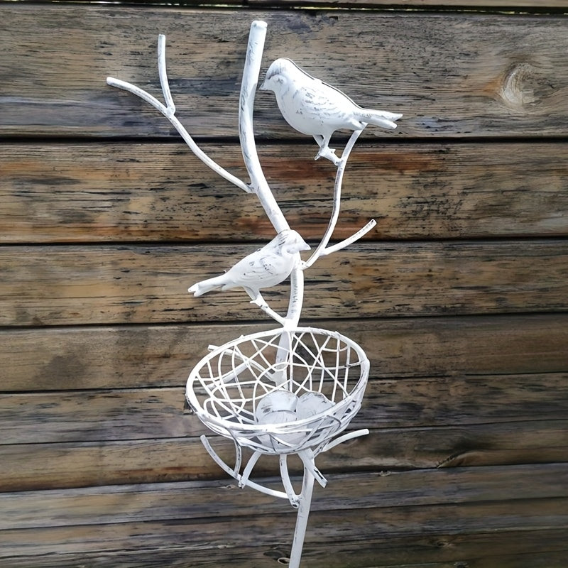 An exquisite faux tree-shaped garden stake with a beautifully crafted simulated bird's nest, perfect for farmhouse gardens and villa courtyard landscaping decor