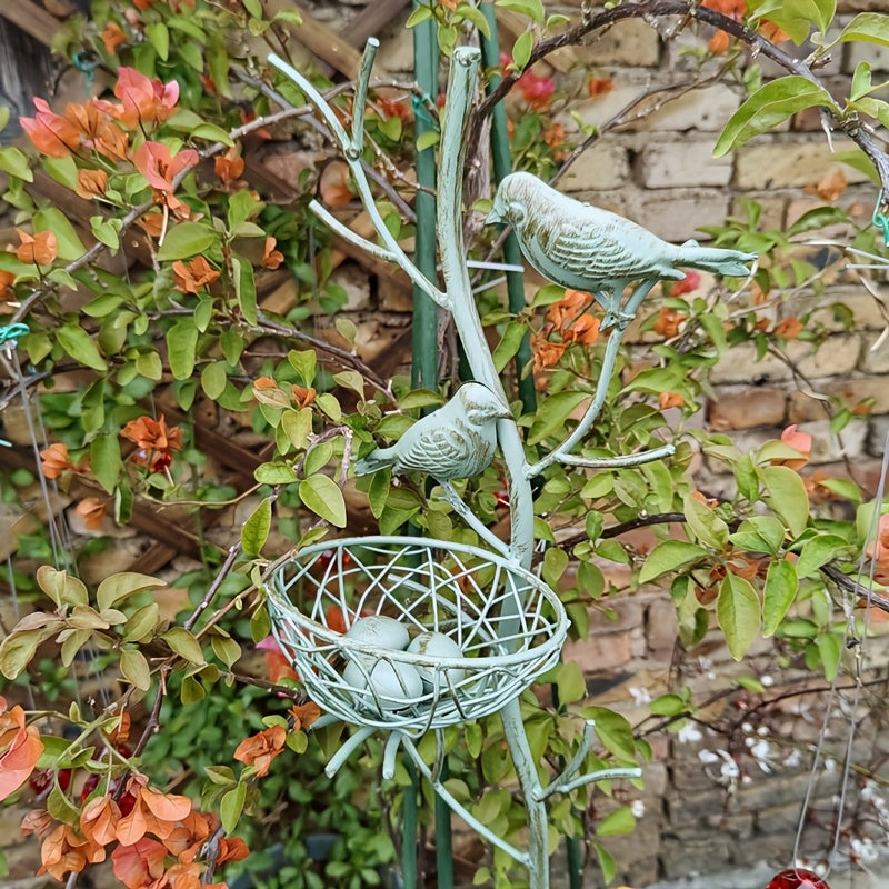 An exquisite faux tree-shaped garden stake with a beautifully crafted simulated bird's nest, perfect for farmhouse gardens and villa courtyard landscaping decor